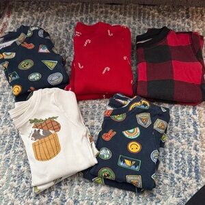 Five pairs of 5T pajamas